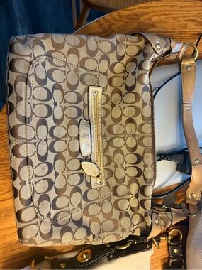 COACH SIGNATURE PENELOPE HOBO BAG. Asking $100.